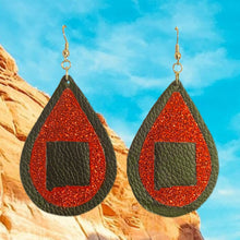 Load image into Gallery viewer, Double sided black and red glitter faux leather nm state teardrop dangle earrings 
