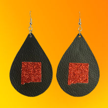 Load image into Gallery viewer, Double sided black faux leather teardrop dangle earrings with red glitter nm shape faux leather accent 
