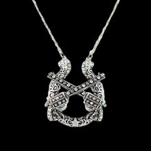 Load image into Gallery viewer, Western Horseshoe and Revolver Necklace
